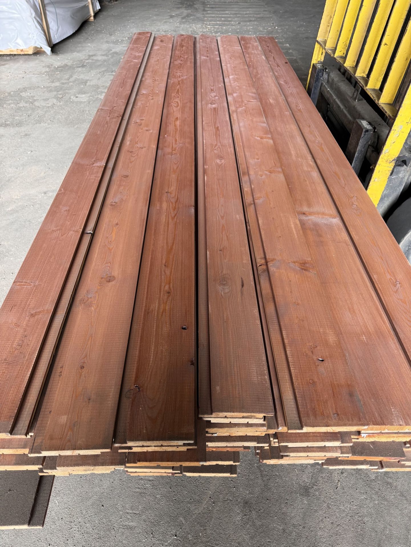 Treated Siberian Larch Cladding AB Grade - Osmo Mahogany colour